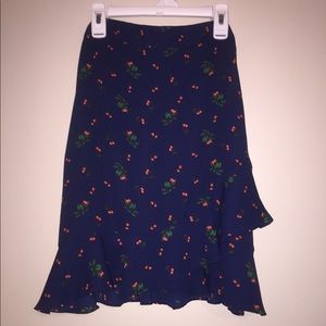 Navy blue skirt w/ cherry print & ruffled bottom